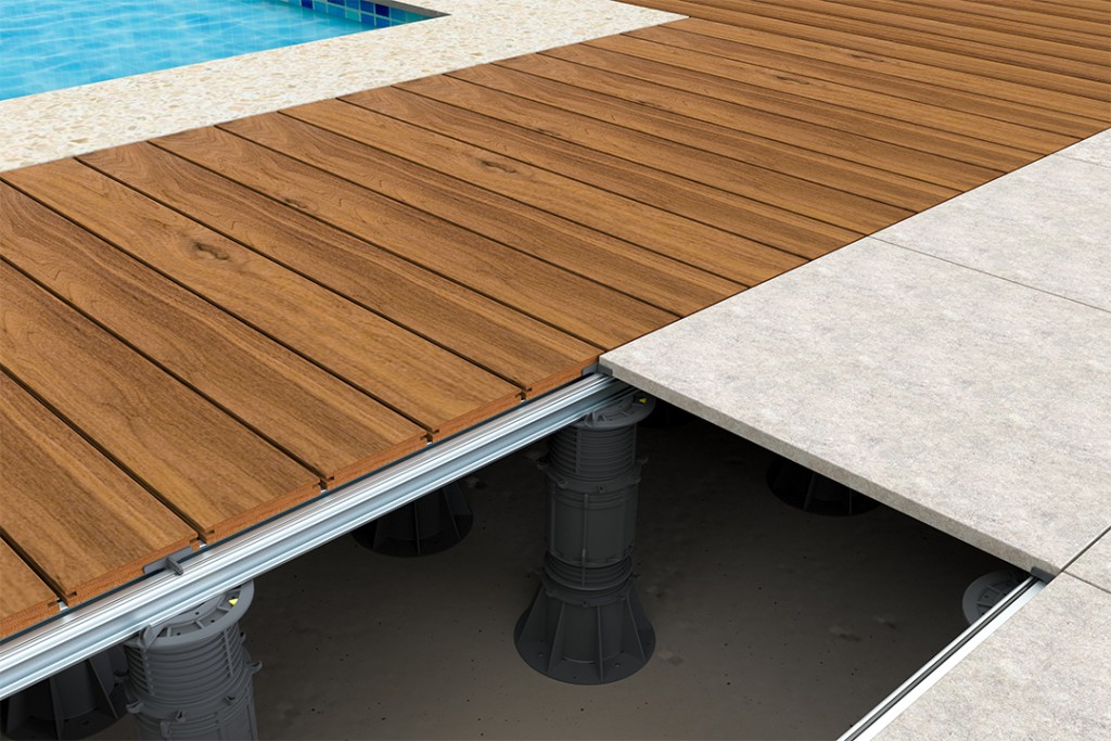 Mixed use of paving and decking system in the same installation